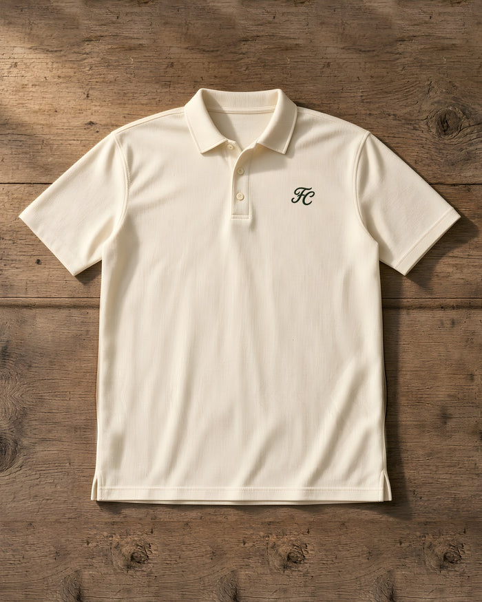 The Member cream golf polo with FC monogram